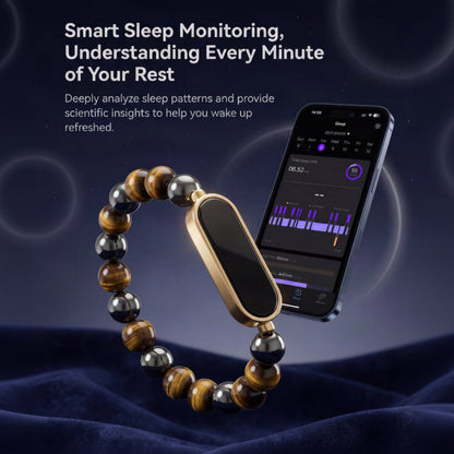 A smart sleep monitoring bracelet with a gold-tone rectangular processor and brown tiger's eye and black beads, shown next to a smartphone displaying a sleep app on a dark blue fabric background with promotional text.